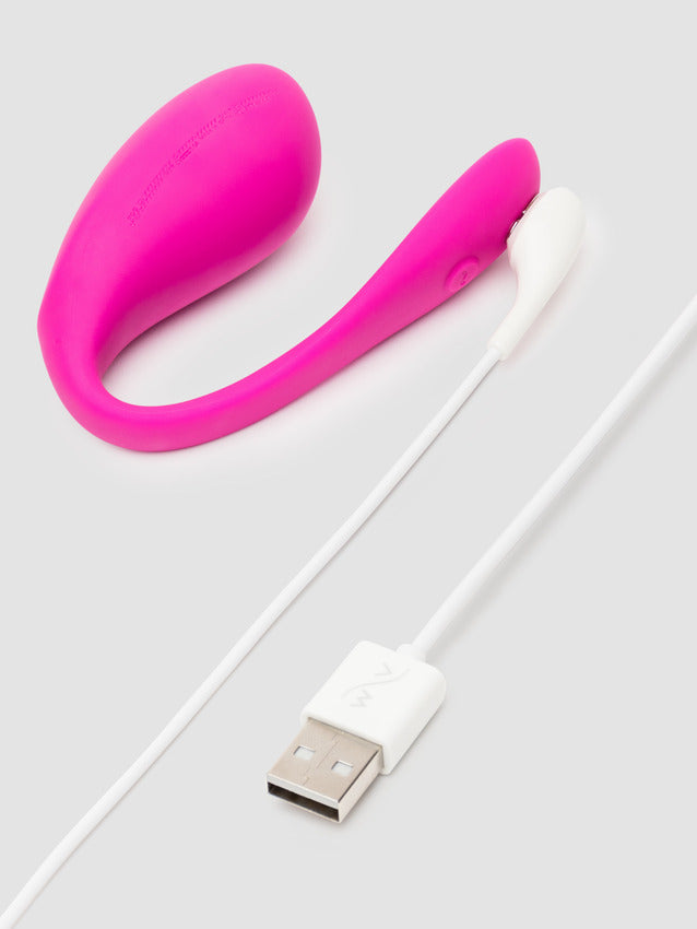 The charger for the We-Vibe Jive 2 shown magnetically connected to the base of the vibrator. The other end of the cable is a USB port. | Kinkly Shop
