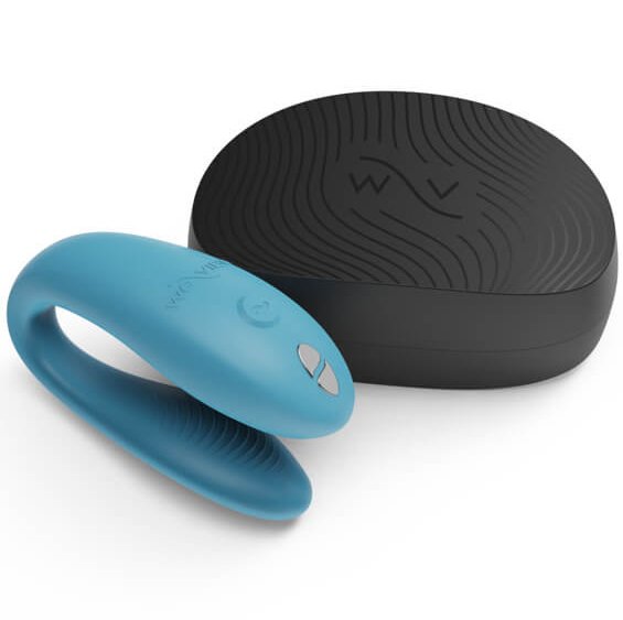 We-Vibe Sync Go sitting out next to the small, toy-fitting black case that comes with it for easy traveling with the vibrator. | Kinkly Shop