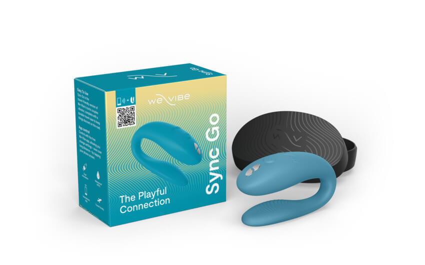 The We-Vibe Sync Go with its packaging in Turquoise. | Kinkly Shop