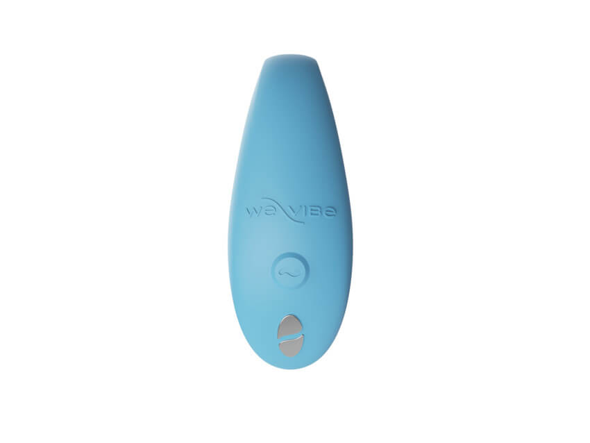 Close-up of the top of the We-Vibe Sync Go showcases the single control button on the top of the toy as well as the two magnetic charging ports that allow the toy to charge. | Kinkly Shop