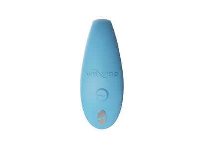 Close-up of the top of the We-Vibe Sync Go showcases the single control button on the top of the toy as well as the two magnetic charging ports that allow the toy to charge. | Kinkly Shop