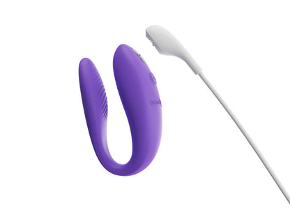 Close-up of the magnetic charging cable shown about to connect to the vibrator, showcasing how the toy charges. | Kinkly Shop