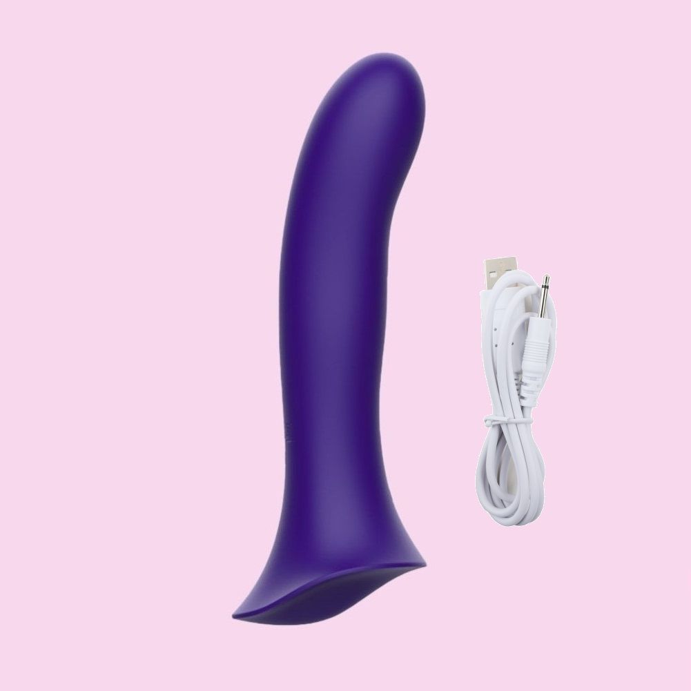 The Wet for Her Fusion 2.0 with Grinding Base shown next to the charging cable that's included with it. | Kinkly Shop