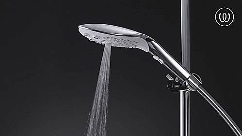 GIF showcases the Womanizer Wave showerhead cascading water out in the Pleasure Jet function. The spray looks very strong and high-pressured with a targeted, dedicated stream that would hit a small area. | Kinkly Shop