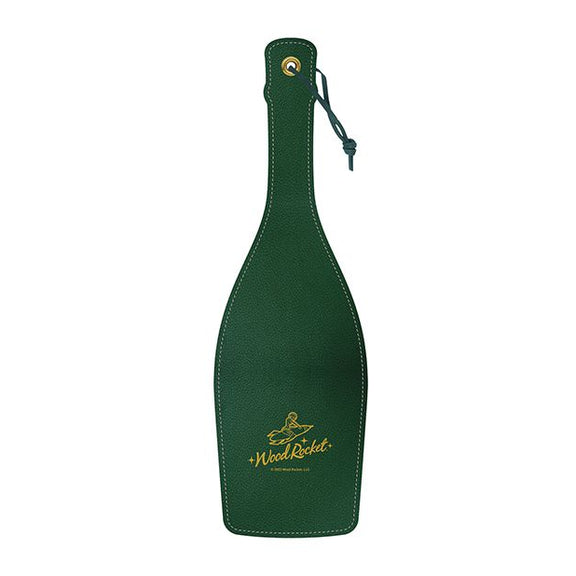 Backside of the Wood Rocket Champain Paddle. It's a deep emerald green aside from the etched, gold "Wood Rocket" emblem near the base. | Kinkly Shop