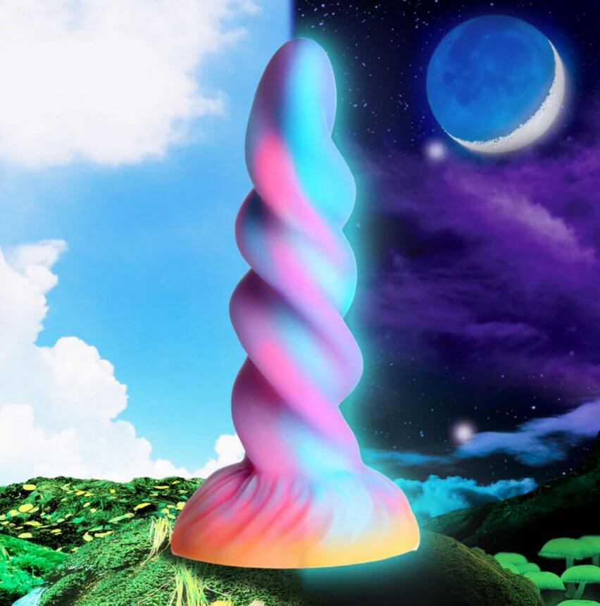 The XR Brands Moon Rider shown with a daylight background on one side and a moonlight background on the other. The moonlight side of the image shows the XR Brands Moon Rider glowing with the glow-in-the-dark pigment in the show. | Kinkly Shop
