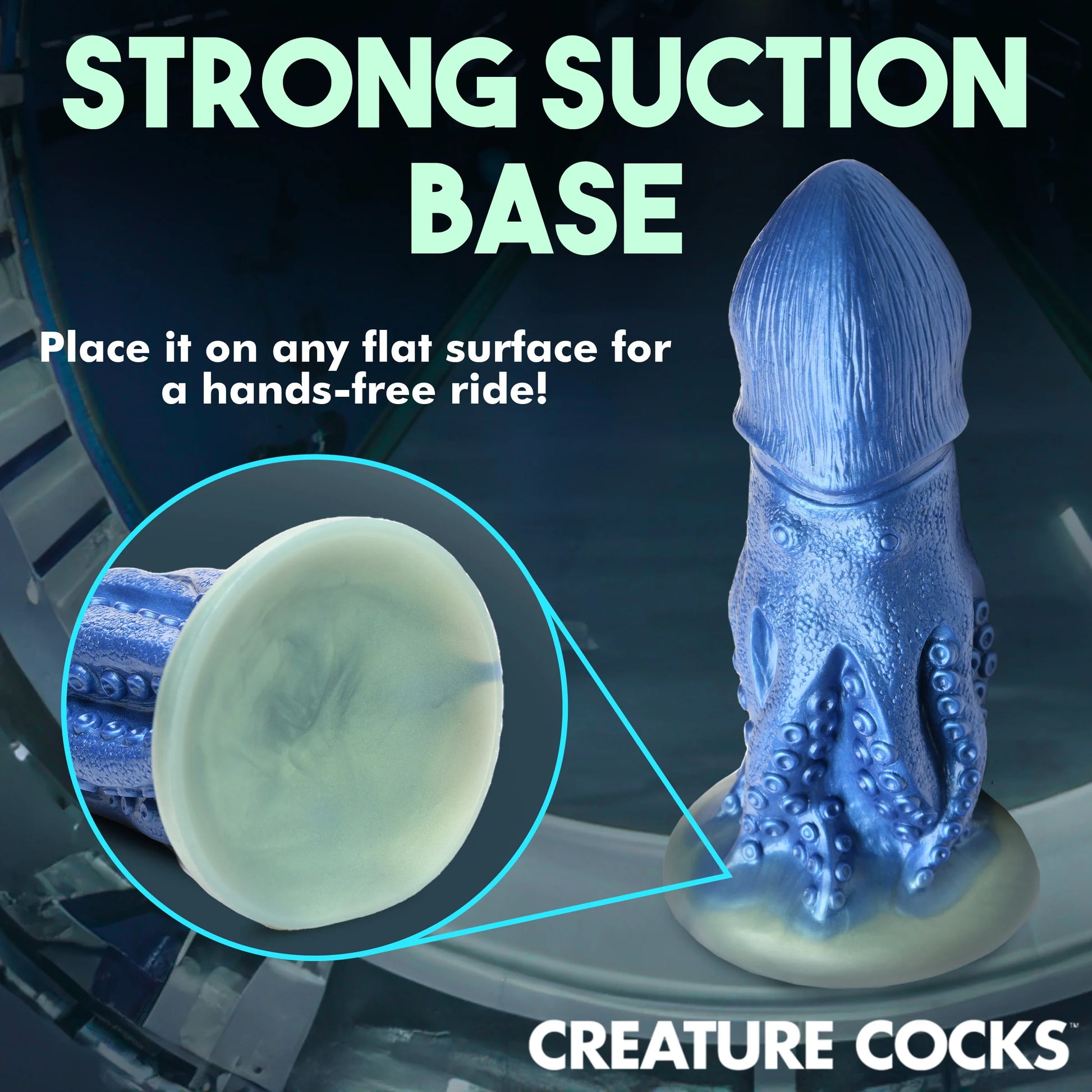 The Creature Cocks Cocktopus shown adhered to a glass table with the suction cup. The text on the image reads: "Strong suction base. Place it on any flat surface for a hands-free ride!" | Kinkly Shop