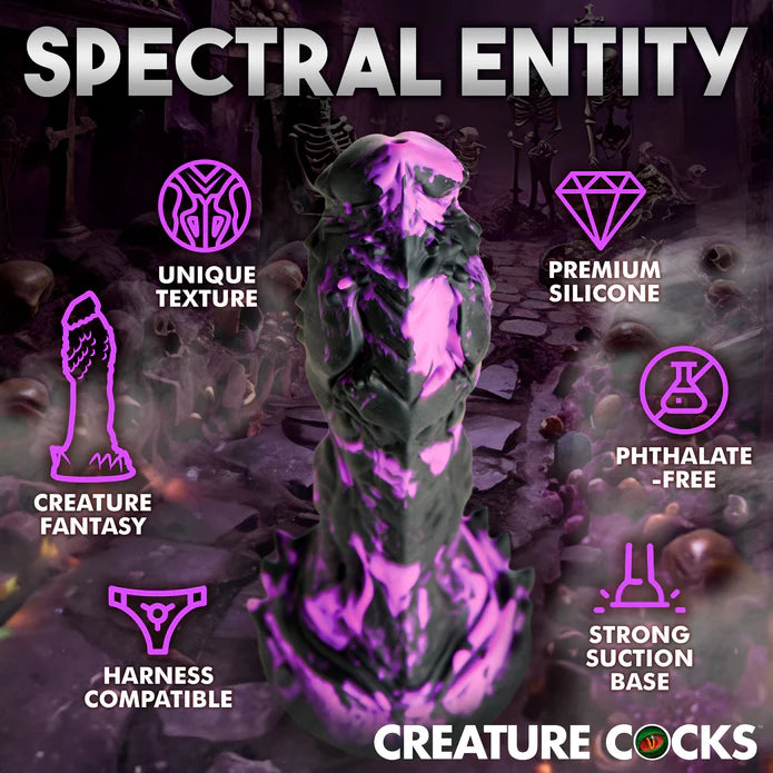 The Creature Cocks Grim shown next to a list of icons and text that describe its features. Text reads: "Unique texture. Creature fantasy. Harness compatible. Premium silicone. Phthalate free. Strong suction base" | Kinkly Shop