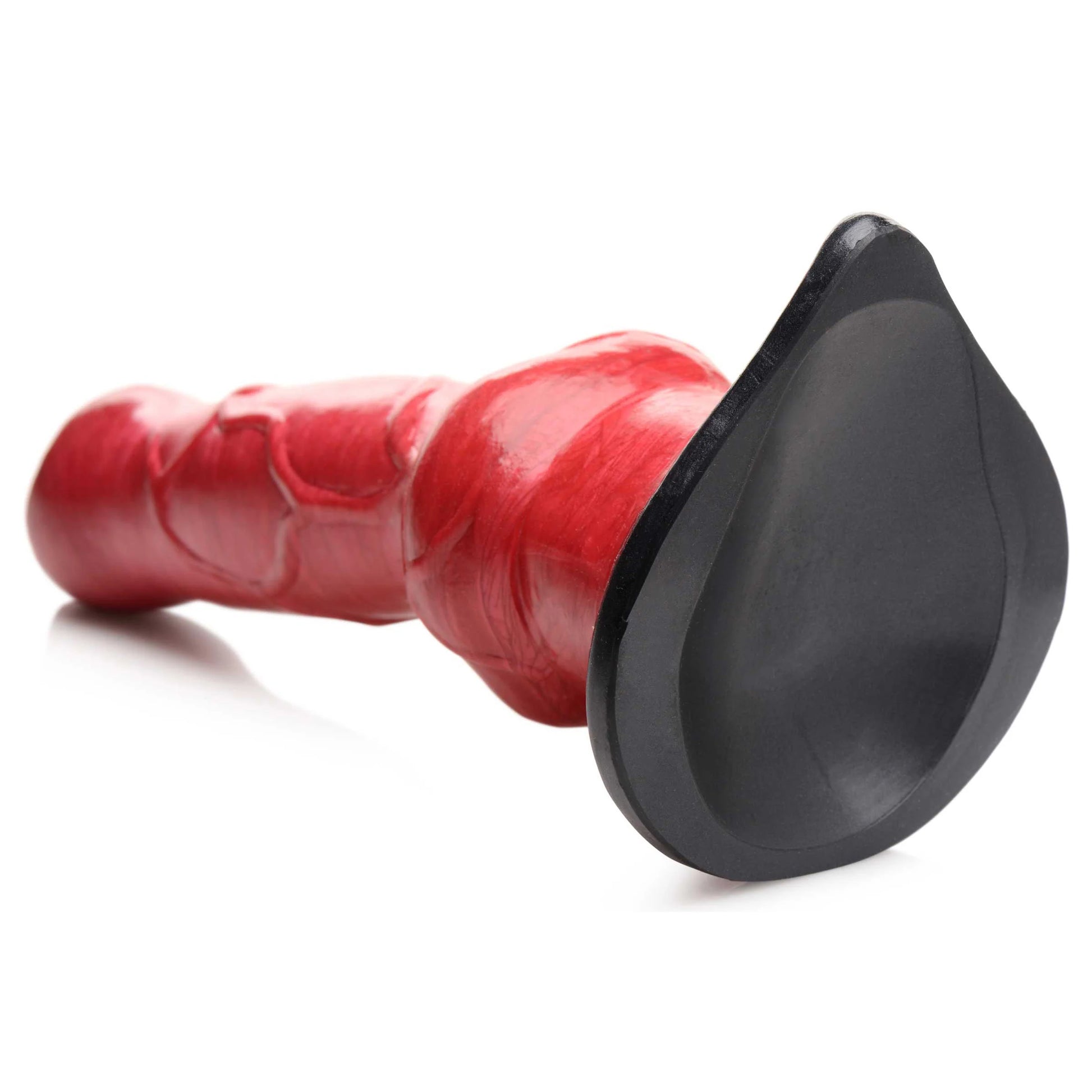 Close-up on the concave design of the Creature Cocks Hell-Hound that makes the dildo function as a suction cup base. | Kinkly Shop