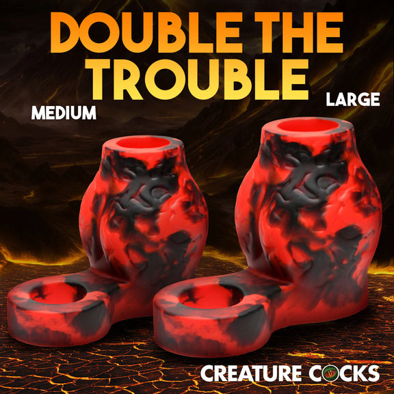 Two Creature Cocks Hell Bound Sleeves shown next to one another. There is a Medium and large size. The Large size looks, well, larger. | Kinkly Shop