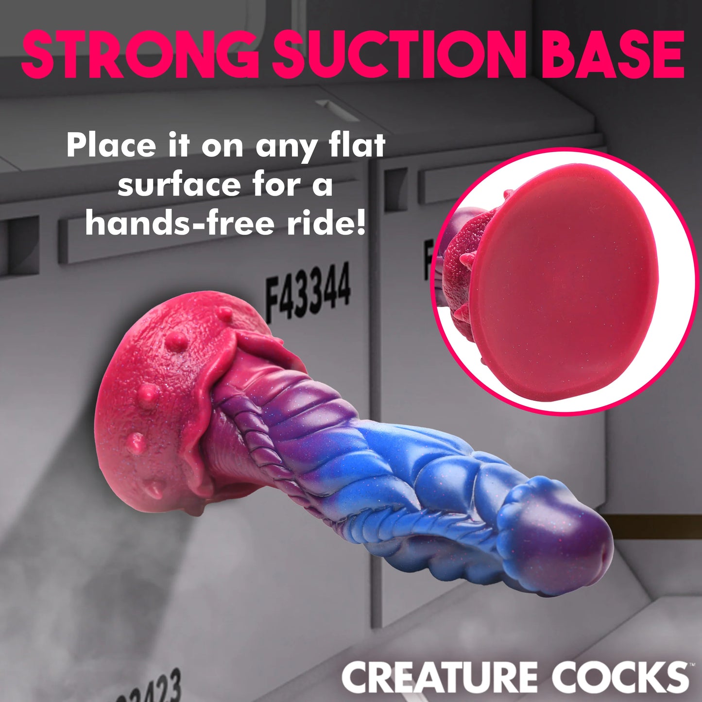 The Creature Cocks Intruder is stuck to the side of official-looking space boxes. Text on the image reads: Strong suction base. Place it on any flat surface for a hands-free ride" | Kinkly Shop