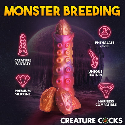 Creature Cocks Nymphoid Ovipositor with Eggs with icons and text showcasing features shown around the dildo. Text reads: "Creature fantasy, premium silicone, phthalate-free, unique texture, and harness compatible" | Kinkly Shop