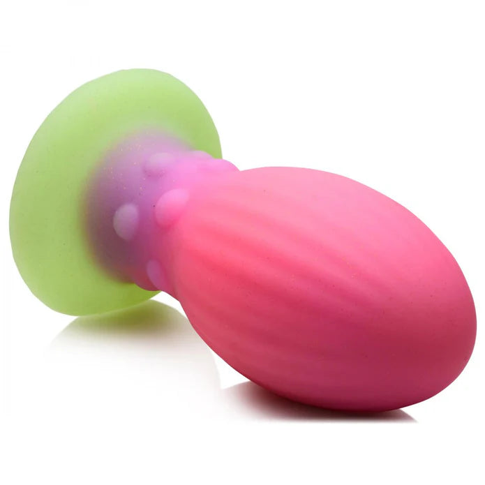 Close-up on the tip of the Creature Cocks XL Xeno Egg. It has a tapered tip with gentle vertical texture lines running down its length. | Kinkly Shop