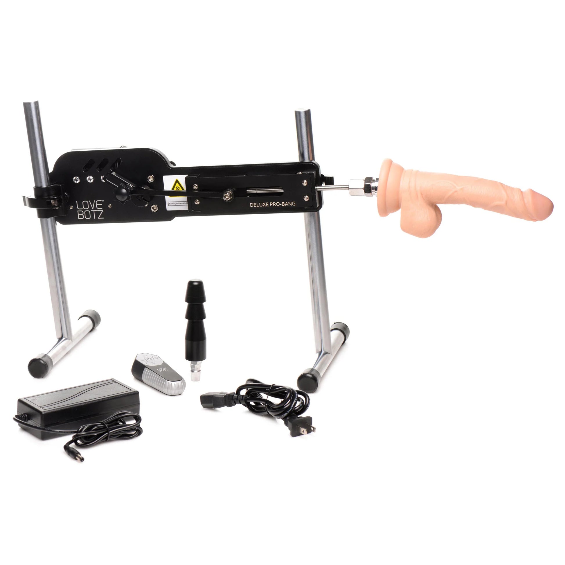 The Deluxe Pro-Bang with Remote Control shown with everything it comes with including the dildo, Vac-U-Lock adapter, wireless remote, machine itself, power box, and power cord. | Kinkly Shop