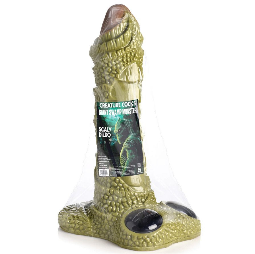 The gigantic dildo shown in the plastic wrapped retail packaging. It will ship inside of a discreet package. | Kinkly Shop