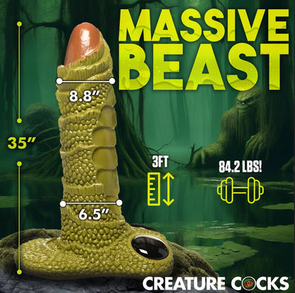 The Giant Swamp Monster Scaly Dildo shown with measurements of the dildo superimposed on top of it. The dildo is 35" tall and over 84 pounds. | Kinkly Shop