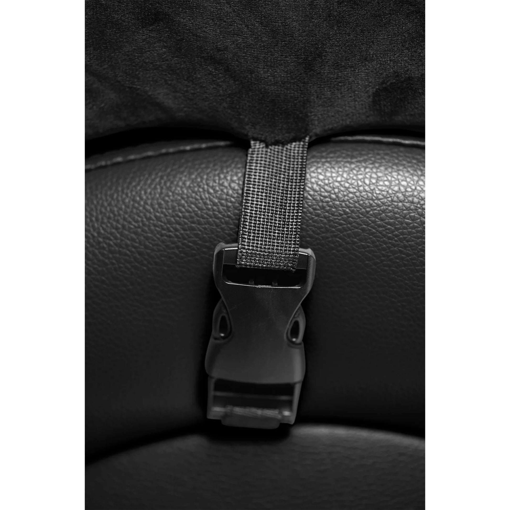 Close-up of the clip-on snaps that help hold the bolster cushions in place on top of the Kinky Couch Bondage Sex Chaise | Kinkly Shop