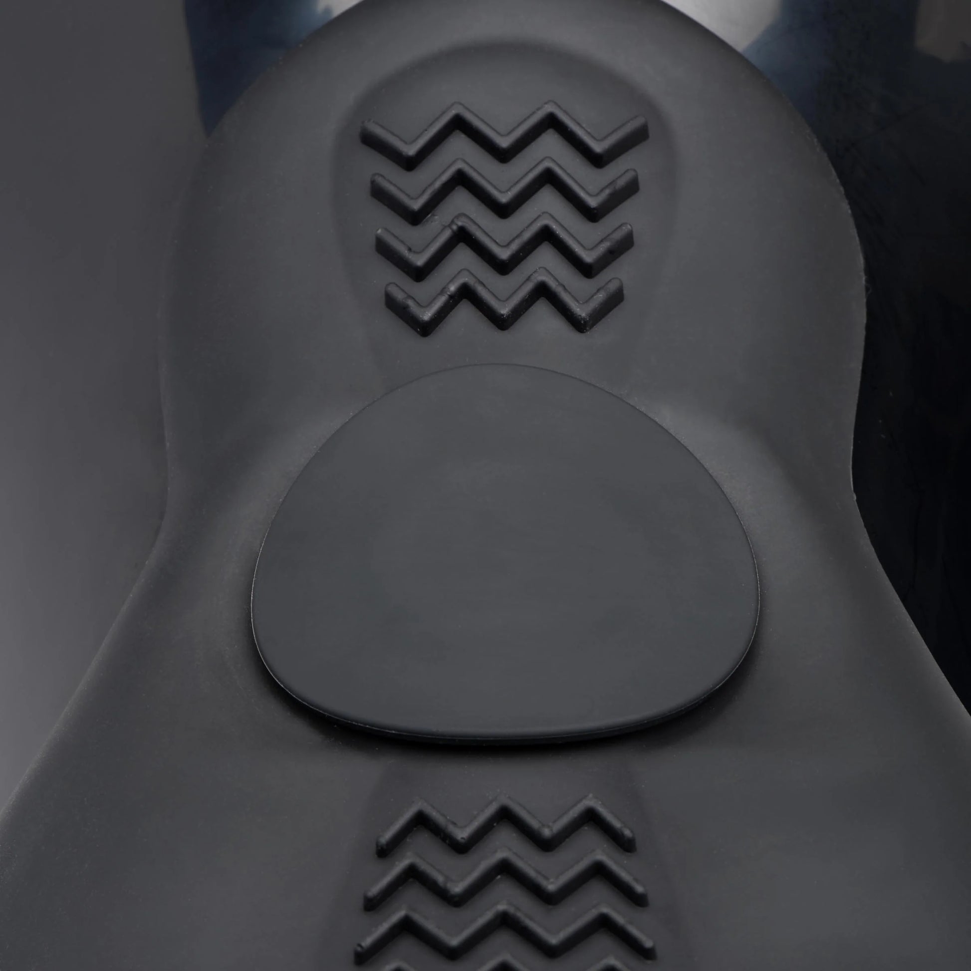 Close-up on the texturing on the top of the The Bucking Saddle Sex Machine that makes for better grinding against the top surface of the machine. | Kinkly Shop