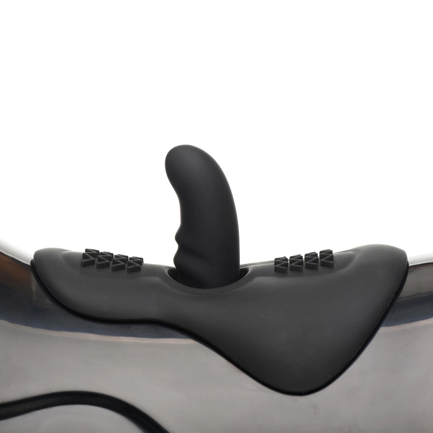 Close-up of the The Bucking Saddle Sex Machine attachment point, with the g-spot/p-spot attachment attached for penetration. It protrudes slightly out from the top of the machine. | Kinkly Shop