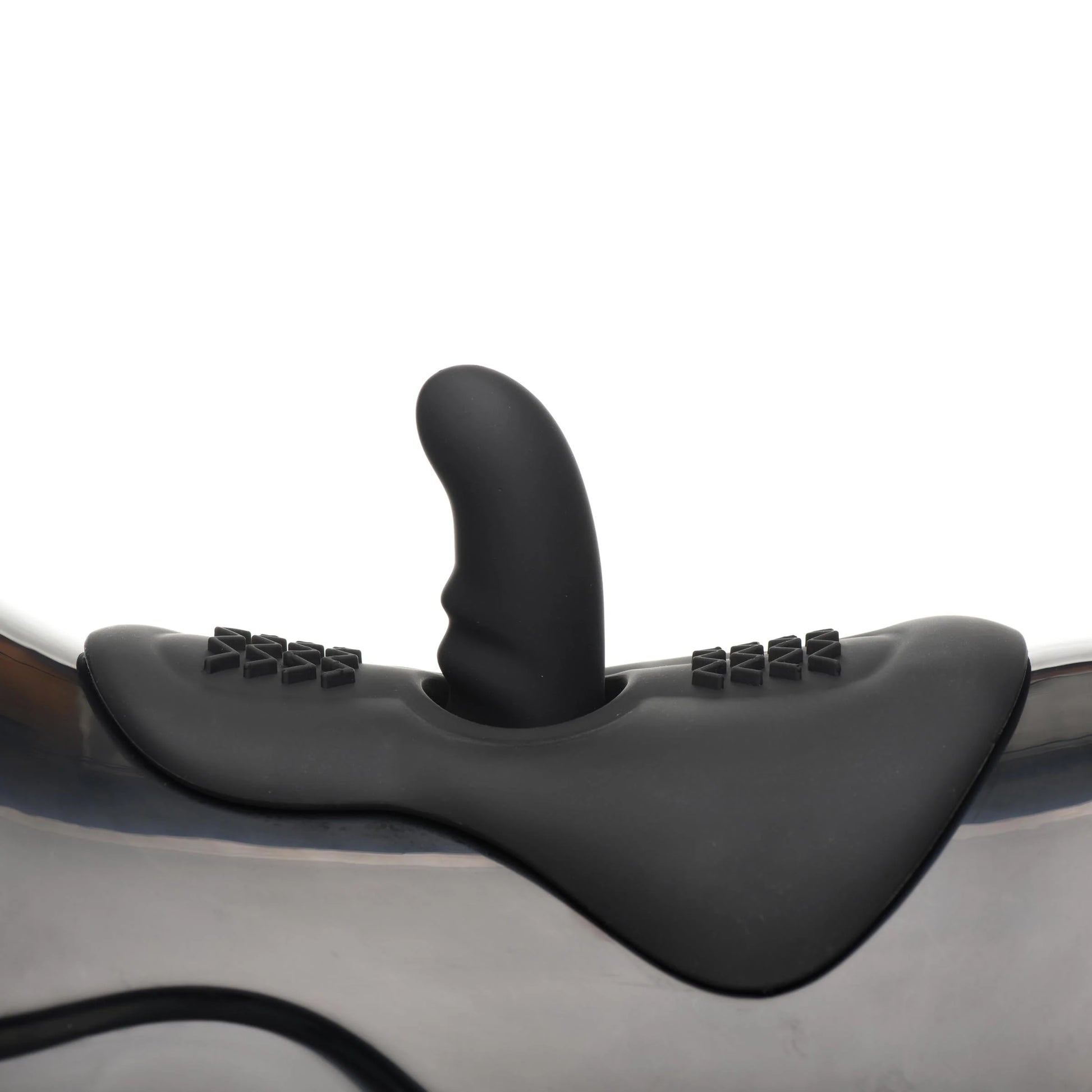 Close-up of the The Bucking Saddle Sex Machine attachment point, with the g-spot/p-spot attachment attached for penetration. It protrudes slightly out from the top of the machine. | Kinkly Shop