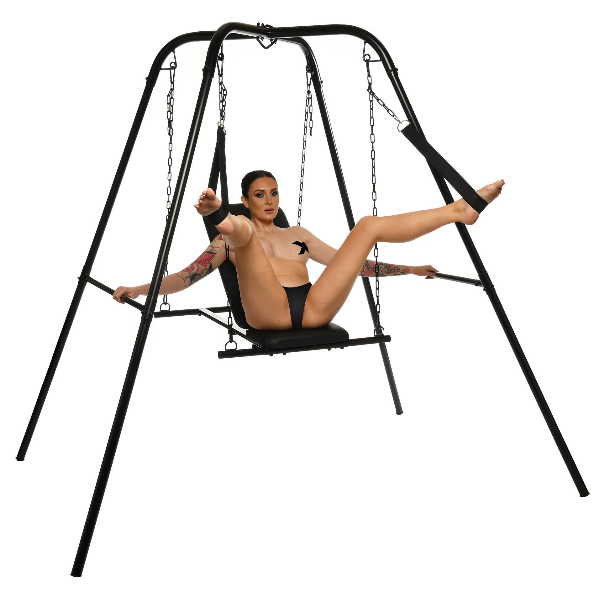 A person is leaning back in the Throne Adjustable Sex Sling with Stand with their feet in the stirrups. They're gripping onto the side bars on the stand for additional leverage | Kinkly Shop