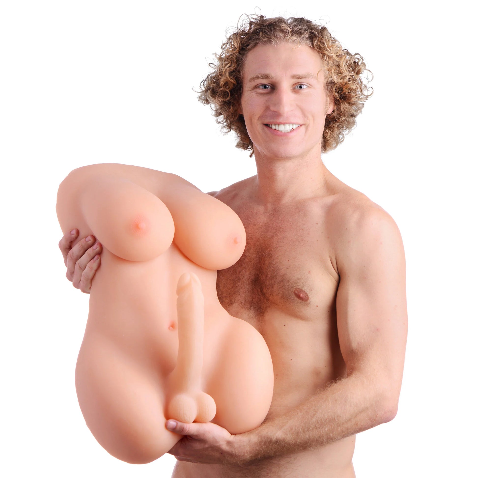 A shirtless person is holding the Transgender Terri Love Doll, looking into the camera. The doll is smaller than the person's torso but not by much. It's about 3/4ths scale to the person. | Kinkly Shop