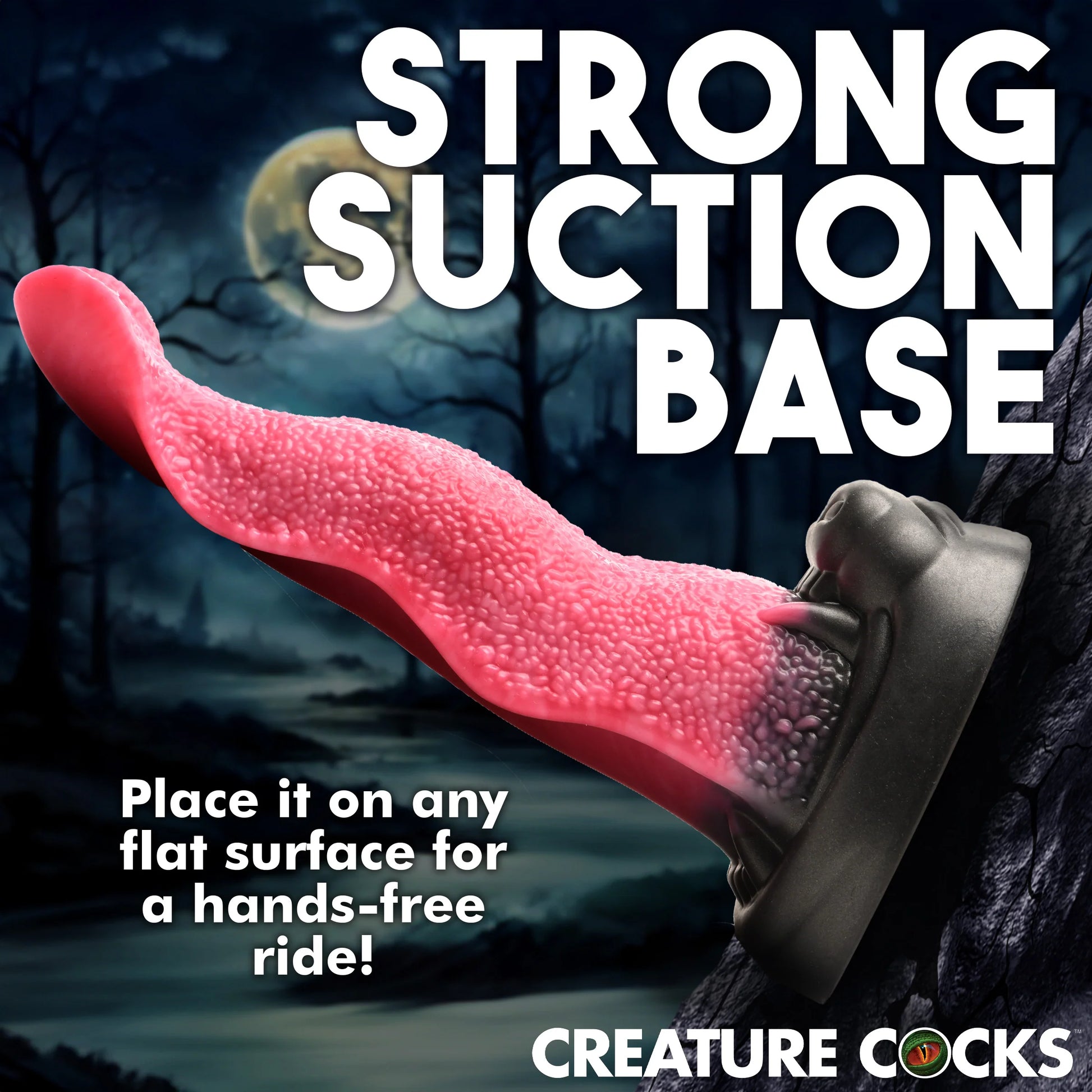 Creature Cocks Wolf's Lick shown suction cupped to a cracked wall. Text on the image reads "Strong suction base. Place it on any flat surface for a hands-free ride." | Kinkly Shop