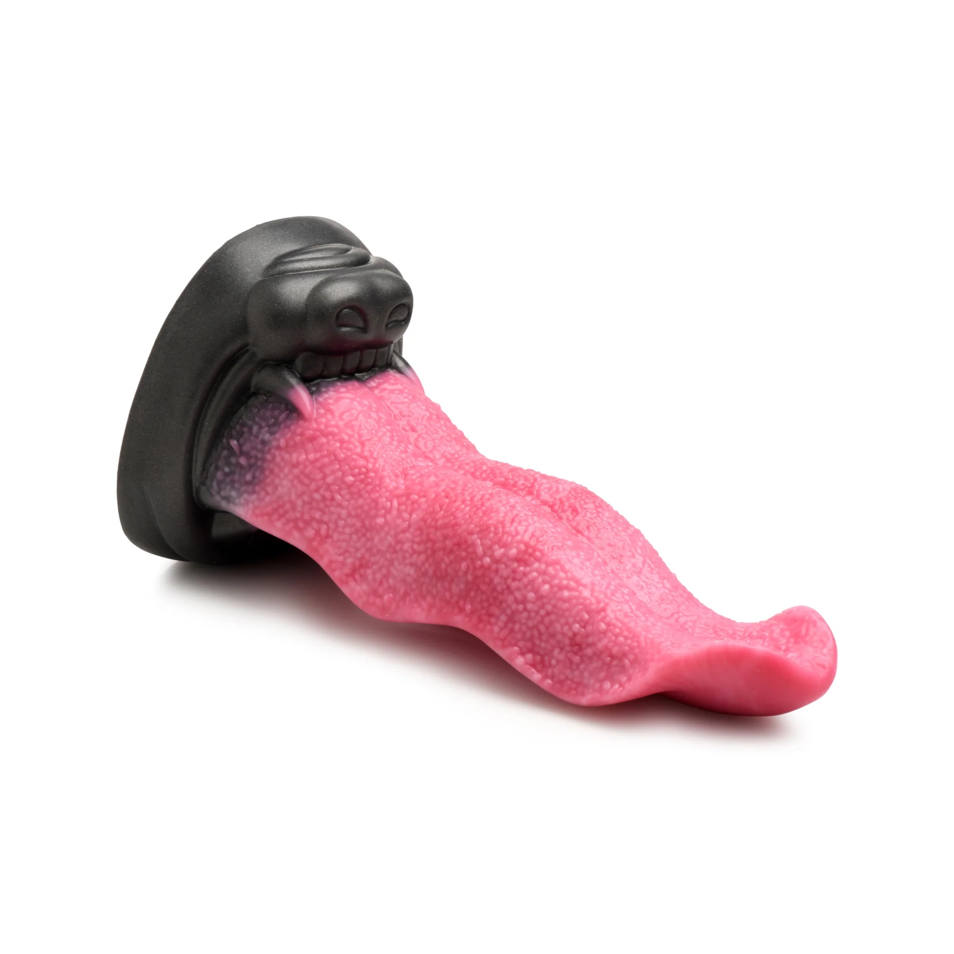Creature Cocks Wolf's Lick in front of a plain white background. The dildo is a textured, life-like tongue with a open mouth "snout" as the base. | Kinkly Shop