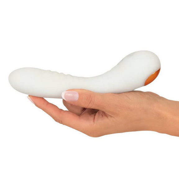 A hand cradles the You2Toys Glow-in-the-Dark G-Spot, showcasing the length of the toy. The g-spot vibrator is slightly longer than the person's outstretched hand by about an inch. | Kinkly Shop