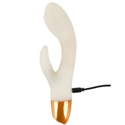 The charging cable connected at the base of the You2Toys Glow-in-the-Dark Rabbit | Kinkly Shop