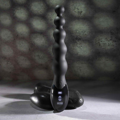 The Zero Tolerance Backdoor Baton with the LED control panel at the base turned on. It shows the battery level and the current number mode it's on. | Kinkly Shop