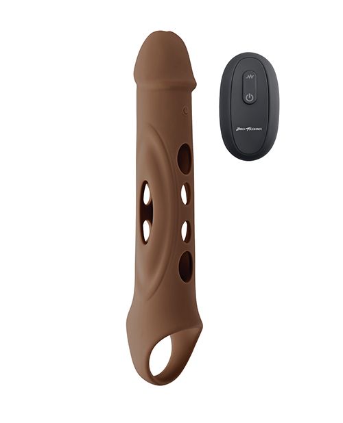 The Evolved Big Shaft Extender in Espresso with the remote control right next to it. The remote control is about 1/3rd of the total length of the extender itself. | Kinkly Shop