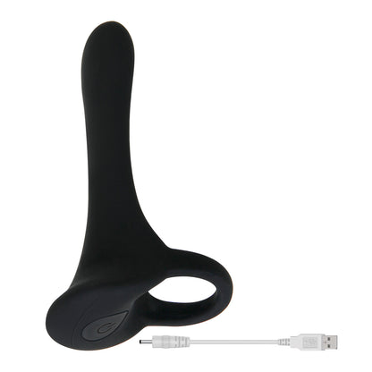 The Zero Tolerance Cock Armor vibrator sitting upright. The charging cable - which has a plug-in port on one side and a USB port on the other - is sitting next to it. | Kinkly Shop