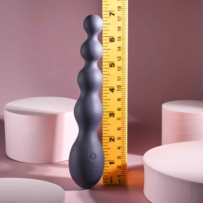 The Zero Tolerance Rumpy Bumpy shown next to a ruler. The vibrator is almost 7" in length. | Kinkly Shop