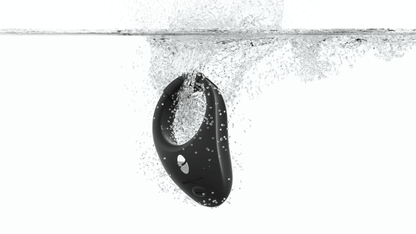 A We-Vibe Bond falling into a clear container of water. There are lots of bubbles and a splash motion to show this. This is just to show that the We-Vibe Bond is waterproof. | Kinkly Shop