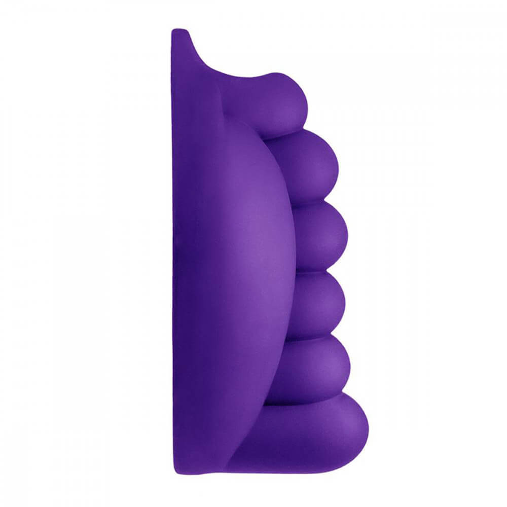 Side view of the Honeybunch Dildo Base Attachment for Pegging Pleasure. This shows how deeply the dildo base attachment is textured. The bubbles towards the top are shallower while the bubbles towards the bottom (where the vaginal entrance would be on a clitoral-owning wearer) are deeper. | Kinkly Shop