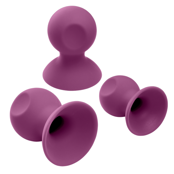 Cloud 9 Nipple Sucker and Clit Sucker Set with two suckers tipped over to show the interior, hollow design that works for the suction | Kinkly Shop