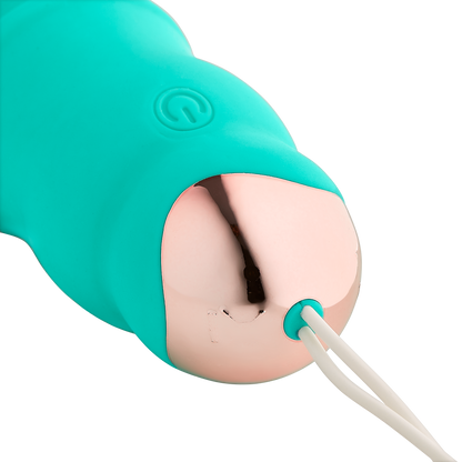 Showing the contrasting metal base with retrieval cord of the Cloud 9 Wireless Remote Control Eggs | Kinkly Shop
