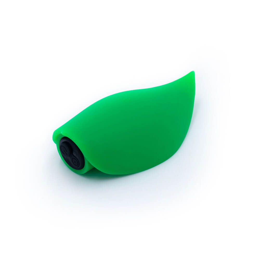 Backside of the Cute Little Fuckers Zeep. The character face of the Zeep is facing the ground which showcases the completely smooth, leaf-like back surface of the Zeep. It comes to a point at the tip of the toy just like a leaf. | Kinkly Shop