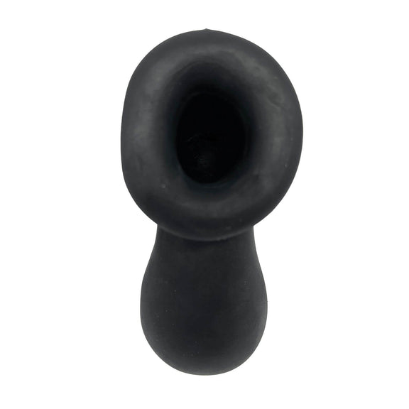 Close-up of the hole that runs throughout the Demon Kat Pack N Jack. It is clearly hollow on the inside with a large, rounded circle that will help provide a good seal around the body part during use. | Kinkly Shop