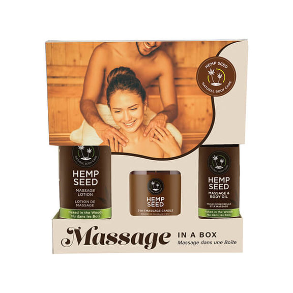 Earthly Body Massage in a Box in Naked in the Woods variety. It shows all three bottles within the packaging with a smiling, happy couple on the front of the box. | Kinkly Shop