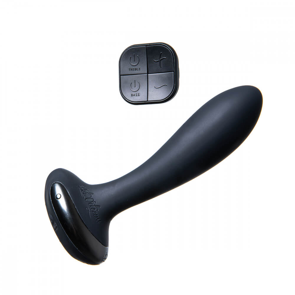 Hot Octopuss PleX with Flex sitting out next to the remote that comes with it. This image clearly shows the tapered design of the insertable portion of the PleX with Flex as well as the completely smooth, textureless shaft. The words "Hot Octopuss" are embedded in the base of the toy. The remote control is about as tall as the base is thick. | Kinkly Shop