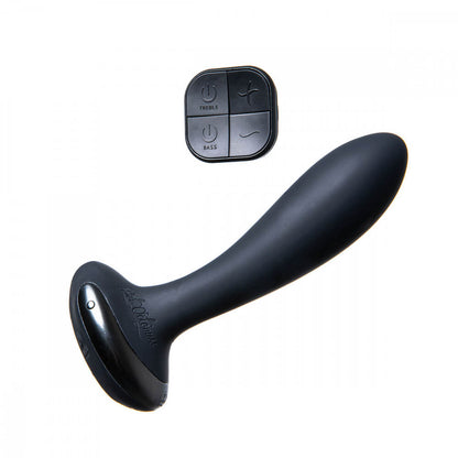 Hot Octopuss PleX with Flex sitting out next to the remote that comes with it. This image clearly shows the tapered design of the insertable portion of the PleX with Flex as well as the completely smooth, textureless shaft. The words "Hot Octopuss" are embedded in the base of the toy. The remote control is about as tall as the base is thick. | Kinkly Shop