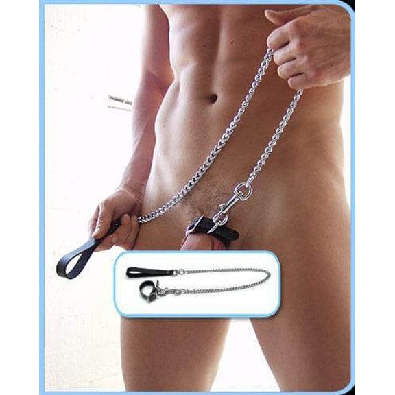 The background of the image is a naked person wearing the Kinklab Cock Ring and Chain Leash Set. They are holding onto their own leash. Covering anything explicit is a picture-in-picture that shows the Kinklab Cock Ring and Chain Leash Set laid flat in front a white background. | Kinkly Shop