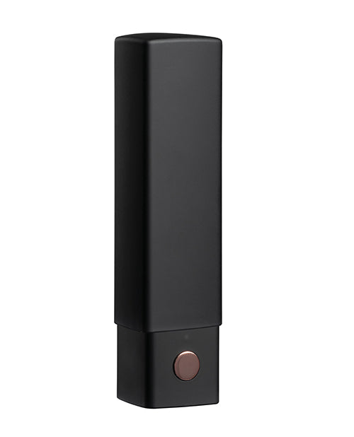 The Lovense Exomoon with the lid on. With the lid on, it looks like a standard tube of lipstick. It has no outward markings that would say what it is. The button at the base even looks like a brand name choice. | Kinkly Shop