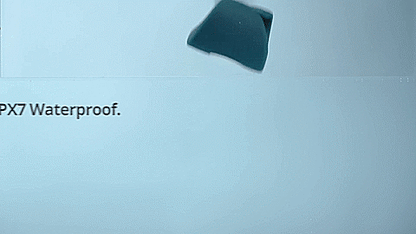 GIF of the Lovense Gush being dropped into a pool of water. The vibrator makes a splash and then continues travelling down until it's out of frame. The text says "IPX7 Waterproof." | Kinkly Shop