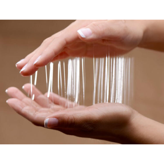 Two hands covered in Nuru Couple's Body Massage Gel are slowly pulling apart from one another. This leaves strings of the slick gel visible between the two hands to showcase the gooey-ness of the Nuru Couple's Body Massage Gel. | Kinkly Shop
