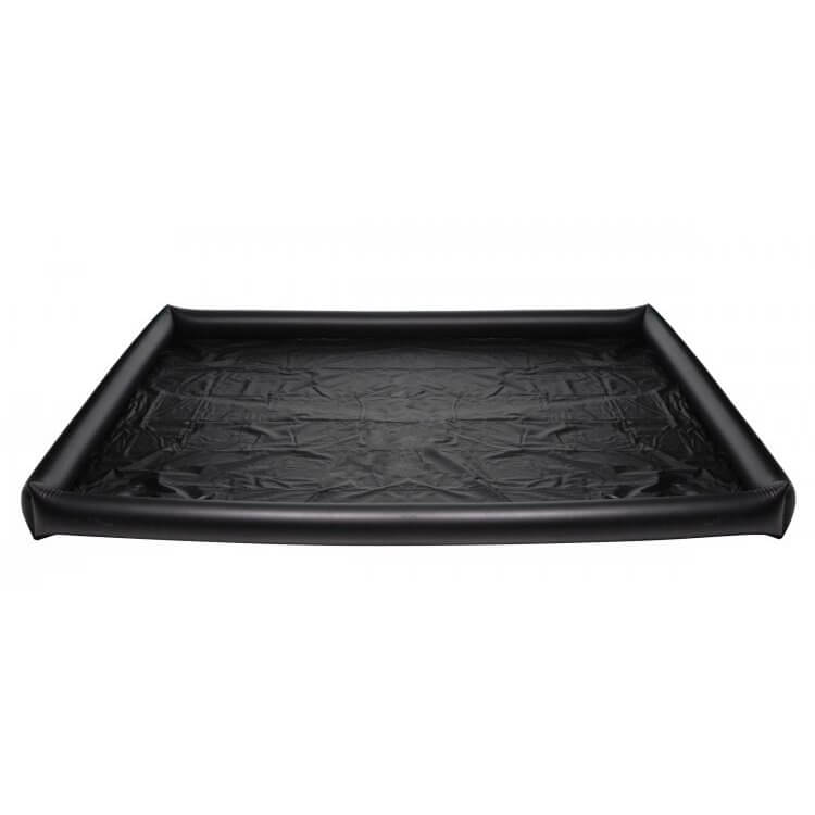 Nuru Inflatable Vinyl Massage Sheet mat when laid out flat and fully inflated. The edges of the entire mat are elevated with round, inflated barriers. It looks like the shortest inflatable "pool" you could imagine - but it's much longer and rectangular. | Kinkly Shop