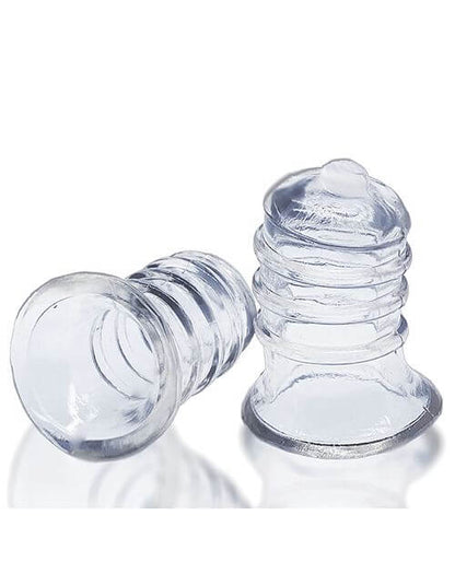 Oxballs Elong Nipsuckers up against a white background. One sucker is sitting upright, resting on the base while the other sucker is tipped over, showcasing the hollow, wide interior that has a lot of space for flesh. The lip of the base is rounded for better grip. | Kinkly Shop