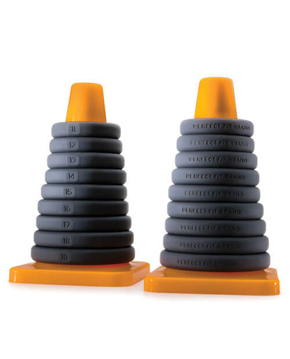Two Perfect Fit Play Zone Cock Ring Sizing Kits sitting side by side. One view of the Perfect Fit Play Zone Cock Ring Sizing Kit shows the "front" side of each of the cock rings which shows the numbered system while the backside view (shown right next to it) shows the backside of all of the cock rings. | Kinkly Shop